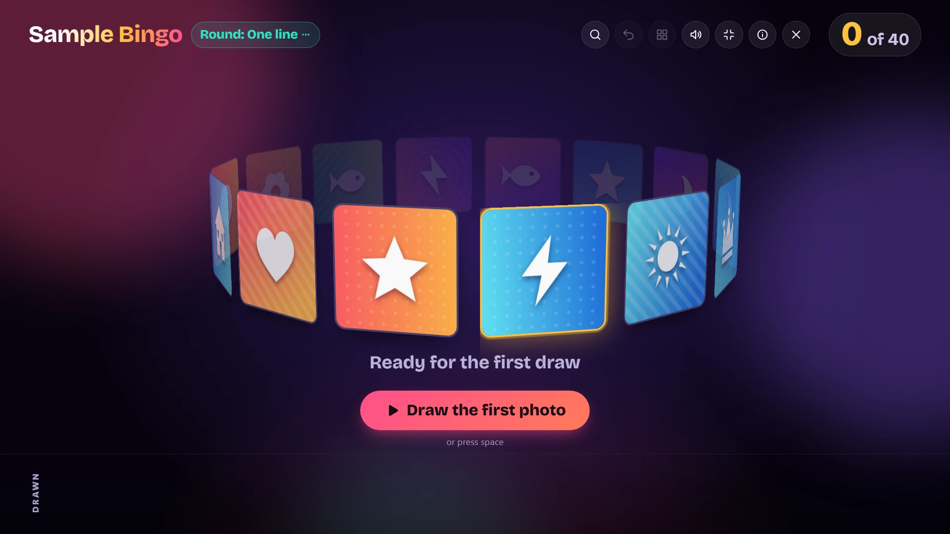 Photo bingo draw screen on the TV, with photos spinning before the first draw